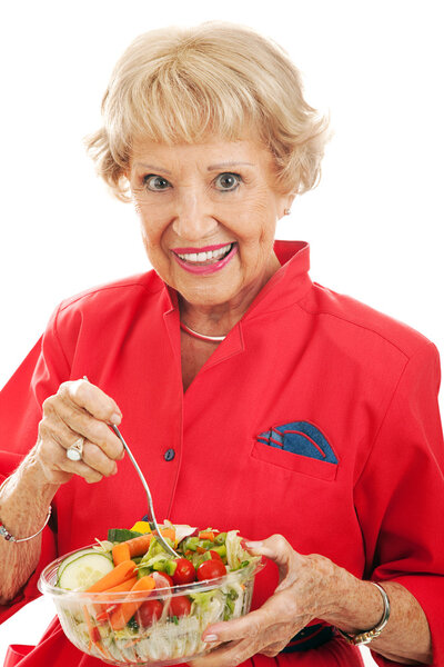 Senior Woman Eats Salad