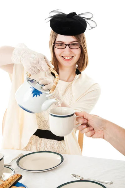 Чаепитие - Teen Serves Tea — стоковое фото