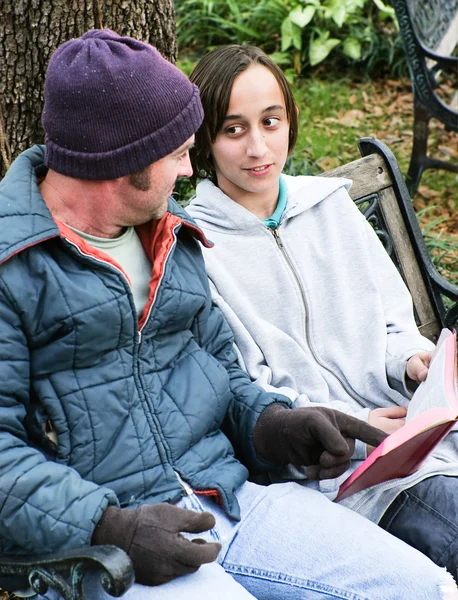 Homeless Family with Bible — Stock Photo, Image