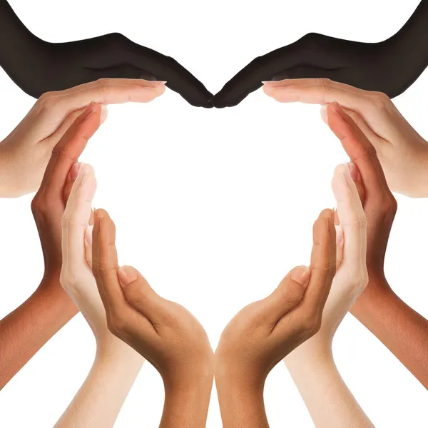 Multiracial human hands making a heart shape on white background — Stock Photo, Image