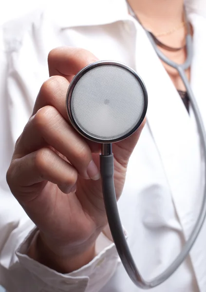 Female hand holding stethoscope, health care concept — Stock Photo, Image