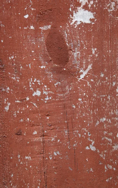 Madera con pintura roja astillada. Fondo estilo grunge — Foto de Stock