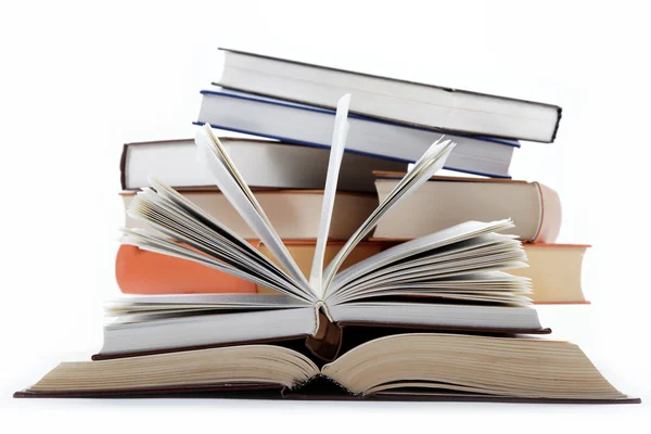 A stack of books on a white background. Stock Photo