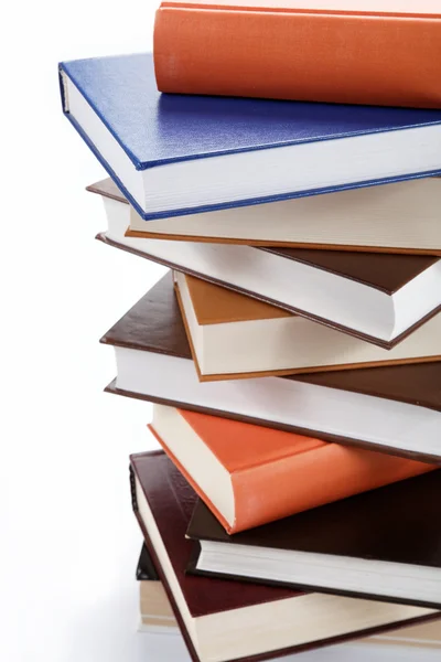 A stack of books on a white background. — Stock Photo, Image