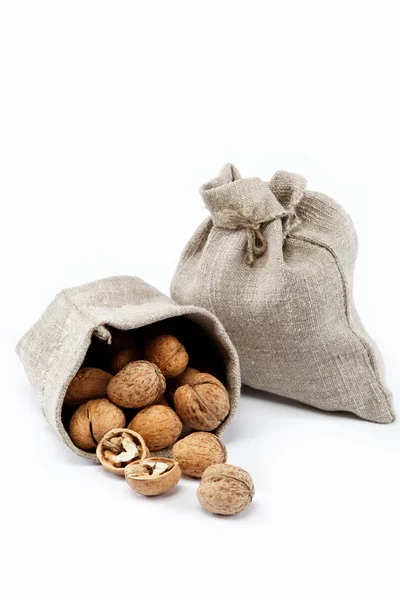 Walnut in a bag on a white background — Stock Photo, Image