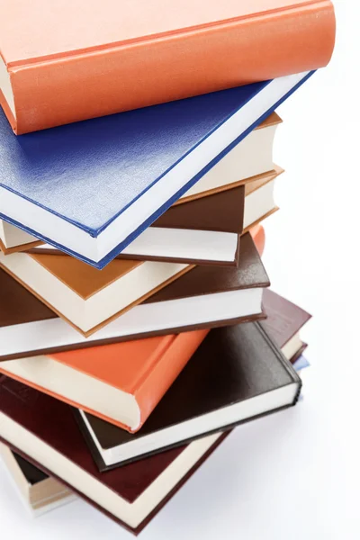 A stack of books on a white background. — Stock Photo, Image