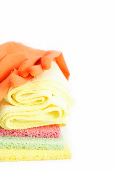 Rubber gloves and a cleaning sponges on a white background. — Stock Photo, Image