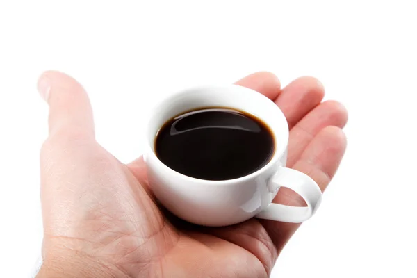 Φλιτζάνι καφέ στο χέρι, που απομονώνονται σε λευκό φόντο. — Φωτογραφία Αρχείου