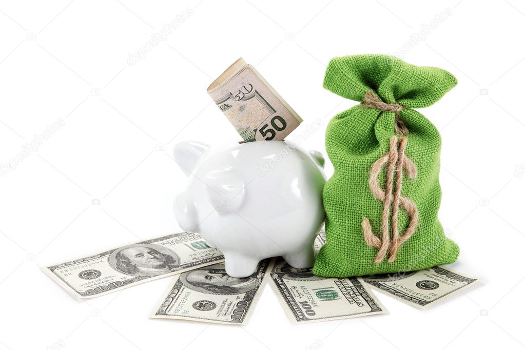 Money and piggy bank isolated on white background.