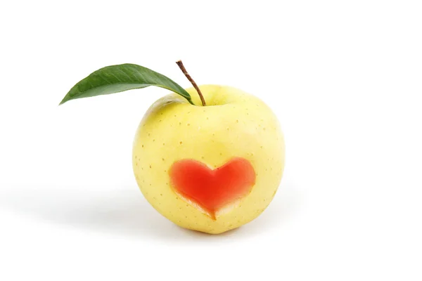 Apple, which cut image of the heart on a white background. — Stock Photo, Image
