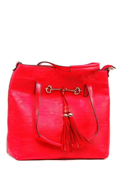Красная женская сумка на белом фоне. — стоковое фото