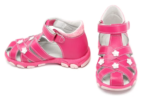 Roze kinder sandalen geïsoleerd op wit. — Stockfoto