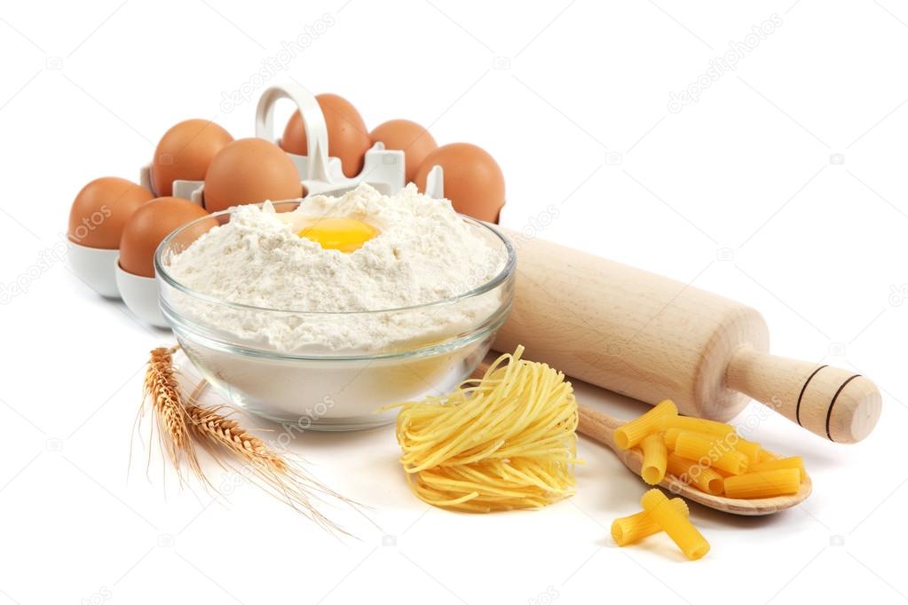 Bakery ingredient. Flour with raw eggs for making dough isolated