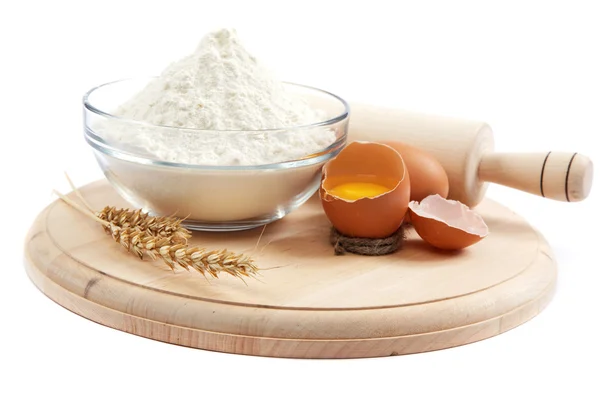 Bakery ingredient. Flour with raw eggs for making dough isolated — Stock Photo, Image