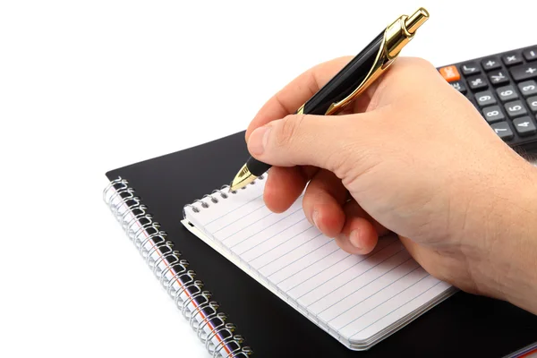 Manos sosteniendo la pluma sobre los documentos . —  Fotos de Stock