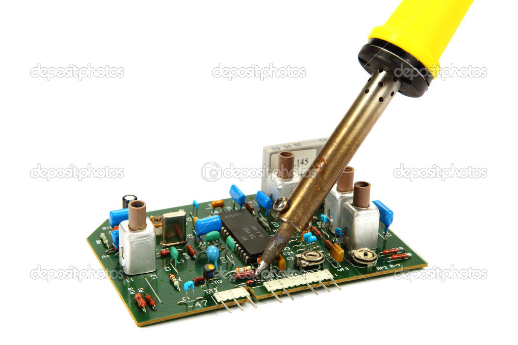 Board and a soldering iron isolated on a white background.