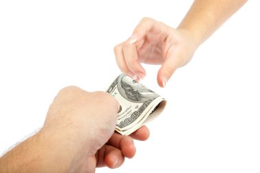 Beyaz bir arka plan üzerinde izole para ile el. dolar faturaları.