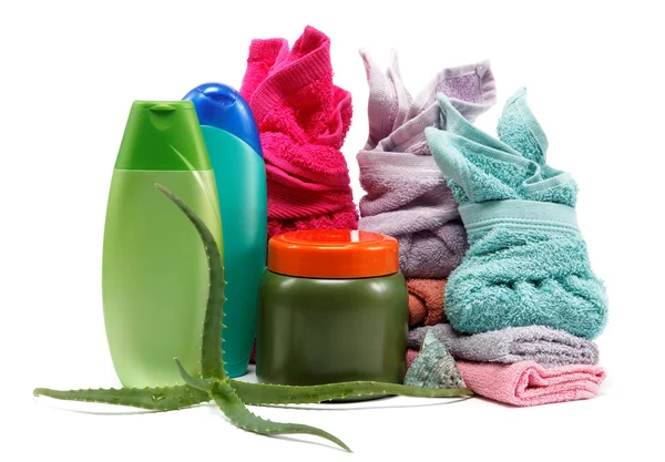 Spa or bathroom concept with towels and soaps, on a white backgr — Stock Photo, Image