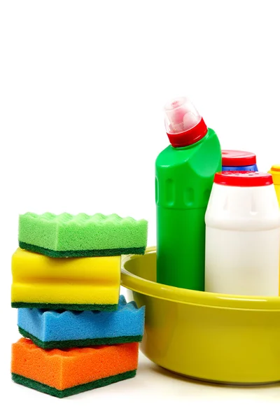 Detergent bottles and cleaning sponge on a white background. — Stock Photo, Image