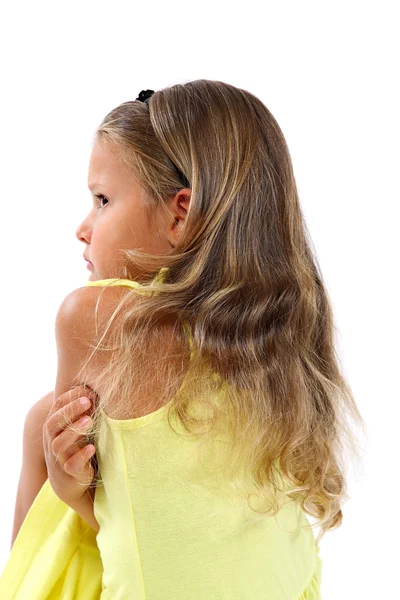 Portrait of a sad sweet little girl from back. — Stock Photo, Image