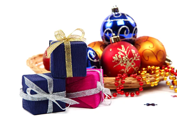 Package with gifts and Christmas ornaments. — Stock Photo, Image