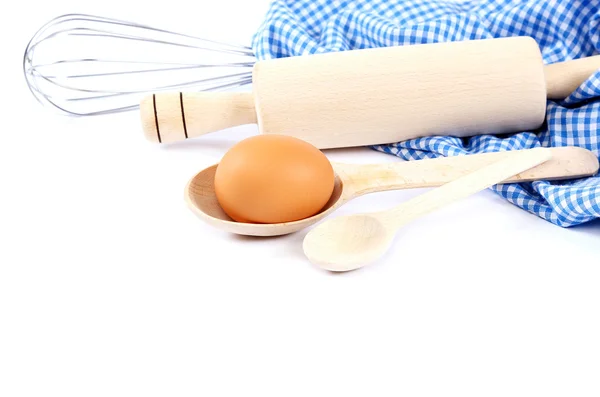 Supplies and egg on white background. — Stock Photo, Image