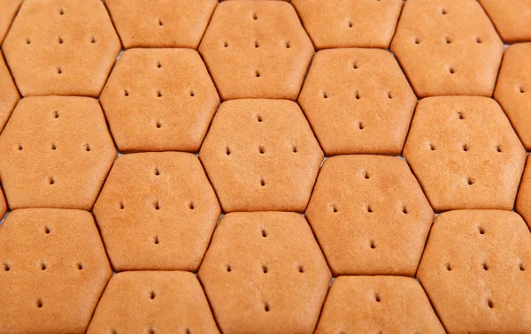 Cracker biscuits piled as background. — Stock Photo, Image