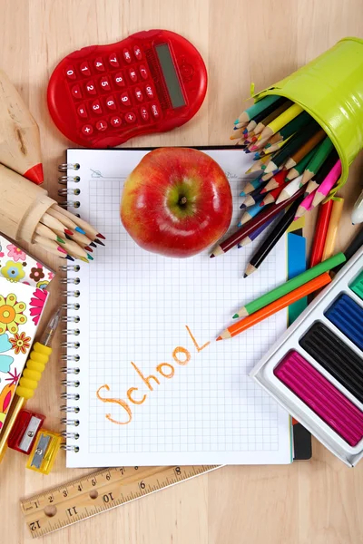 School and office supplies on a wooden table. — Stock Photo, Image