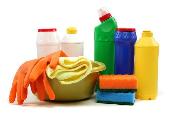 Detergent bottles, rubber gloves and cleaning sponge. — Stock Photo, Image