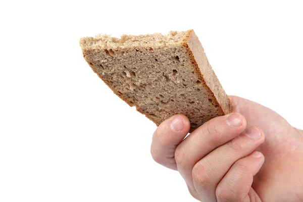 Sneetje brood in hand geïsoleerd op witte achtergrond. — Stockfoto