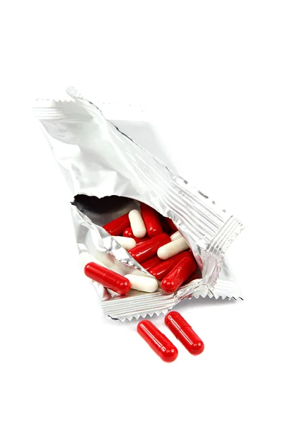 Mediciner. piller kapslar på vit bakgrund. — Stockfoto
