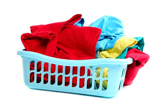 Clothes in plastic basket isolated on white. — Stock Photo, Image
