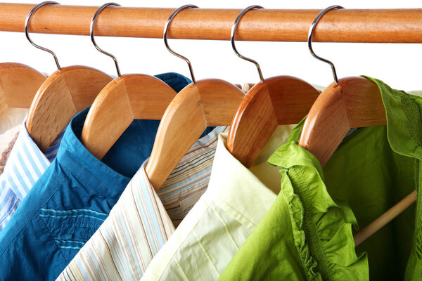 Fashion clothing on hangers at the show.