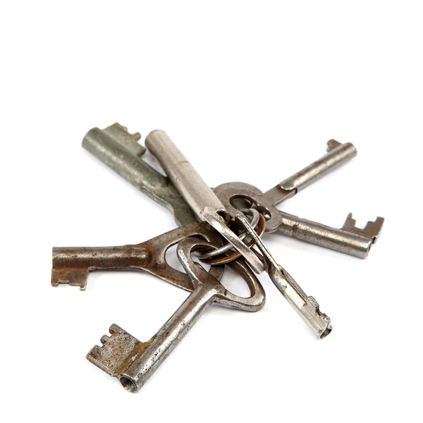 Old keys on a white background. — Stock Photo, Image