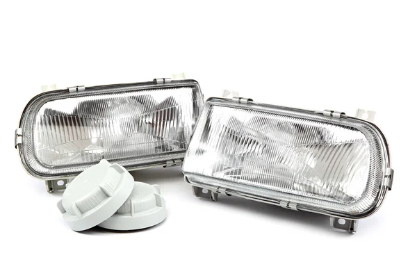 Car headlights isolated on a white background. — Stock Photo, Image