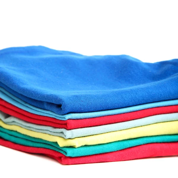 Stack of clothes on white background. — Stock Photo, Image