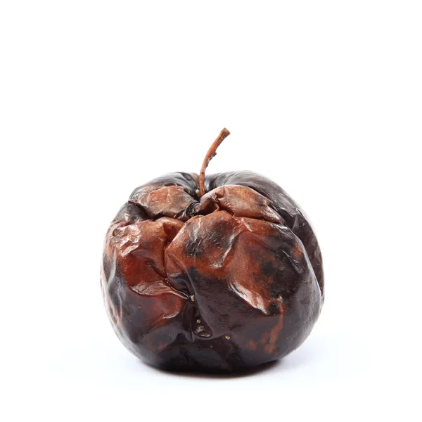 Rotten apple on a white background. — Stock Photo, Image
