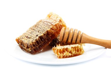 bal tarak platel ve tahta sopa.