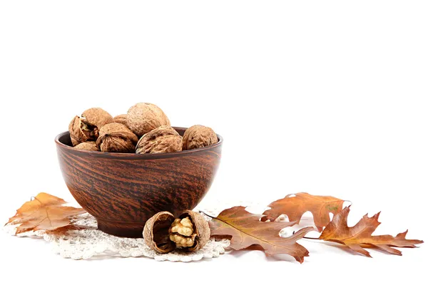 Walnuts in wooden bowl. Autumn time. — Stock Photo, Image