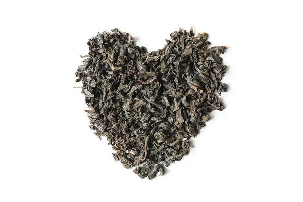 Feuilles de thé sèches forme de coeur — Photo
