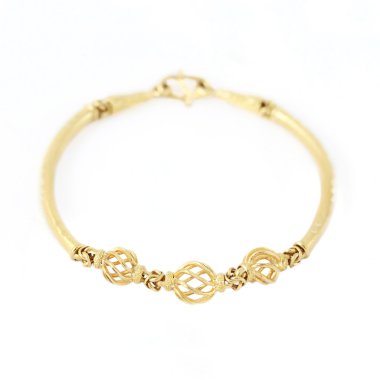Gold bracelet isolated on white background clipart