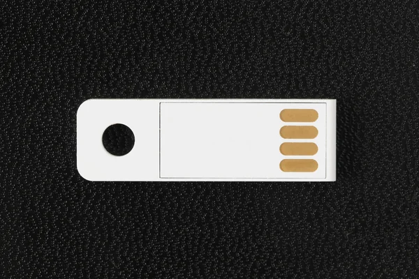 White flash drive on drak background — Stock Photo, Image