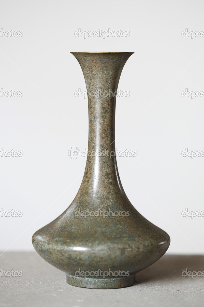 Small antique bronze vase