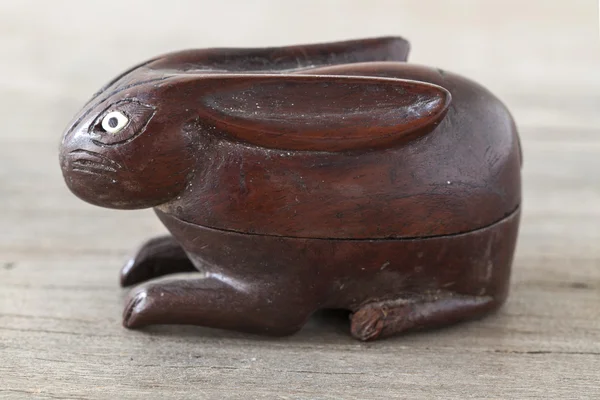 Wooden rabbit on wooden table — Stock Photo, Image