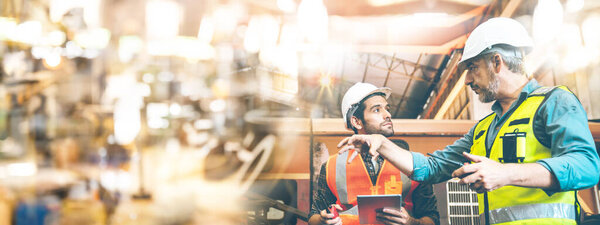 professional engineers or technician foremen team with safety helmets are work on machine quality control in industrial factory, production teamwork of construction technology in manufacturing business