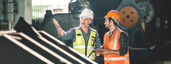 industrial factory with men at work concept, professional engineers foreman inspectors talking in business occupation job teamwork with team, construction managers working in manufacturing technology job