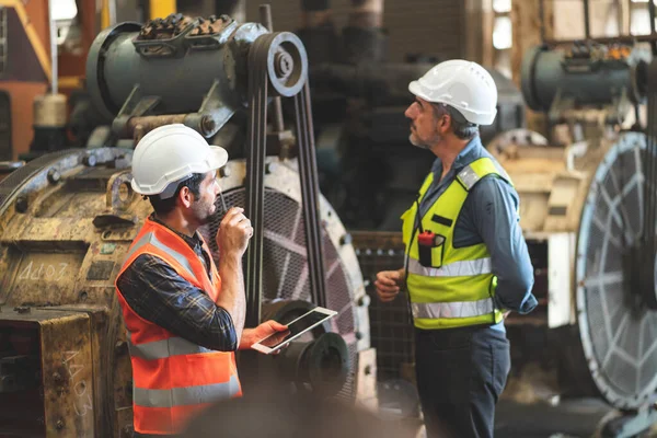 industrial factory with men at work concept, professional engineers foreman inspectors talking in business occupation job teamwork with team, construction managers working in manufacturing technology job