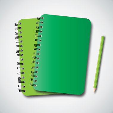 Yeşil defter ve kalem