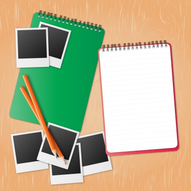 Yeşil defter ve fotoğraf çerçevesi