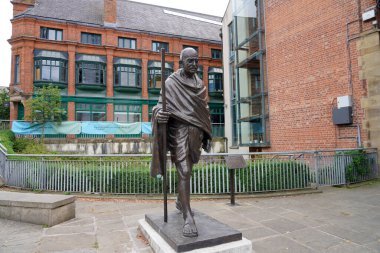 MANCHESTER, UNITED KINGDOM - JULY 13, 2022: Mahatma Gandhi statue in Manchester, UK